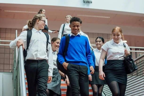 Image of kids in school uniform. Old EasyJet uniforms to help families save on school clothes