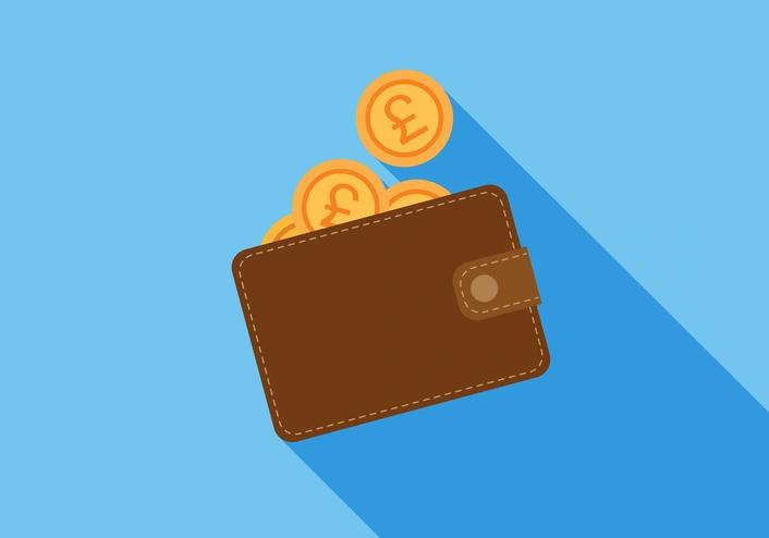 wallet with pound coins falling into it